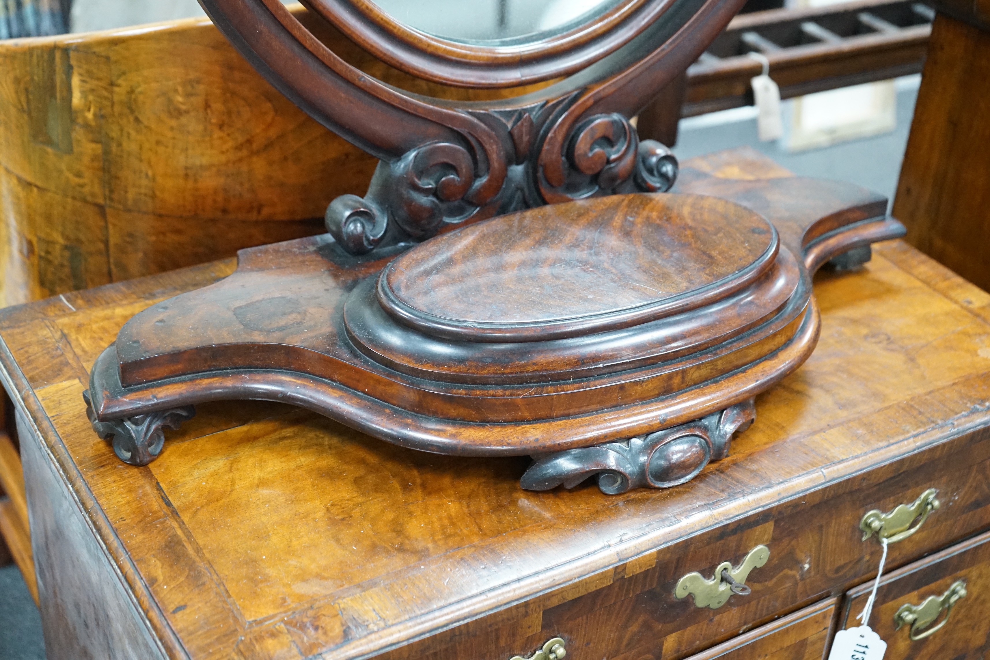 A Victorian mahogany toilet mirror with compartment base, width 66cm, height 82cm